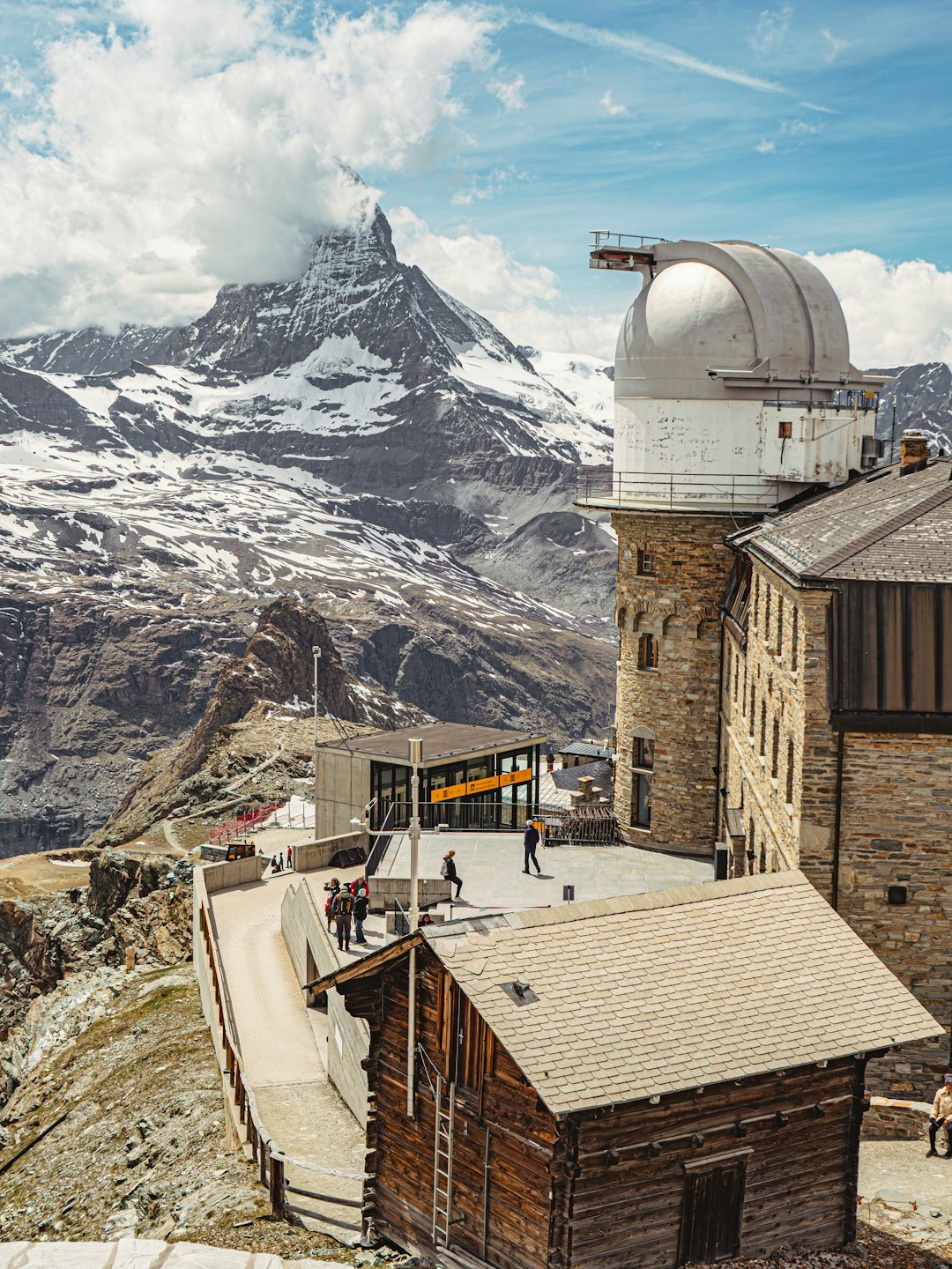 swiss mountain landscape with factory